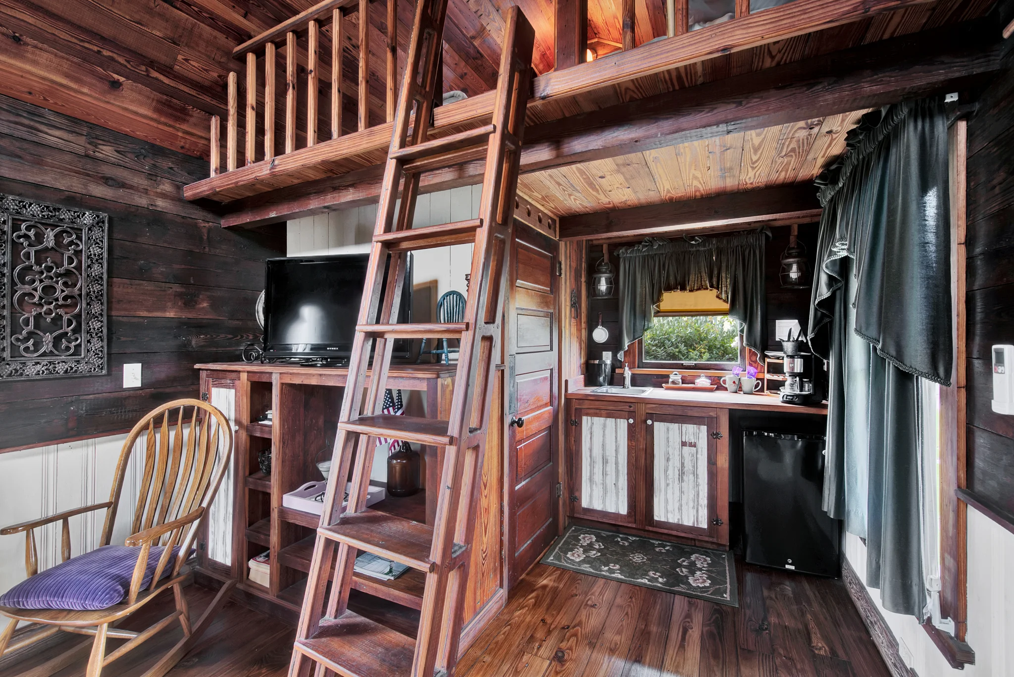 ladder to loft area of bed and breakfast