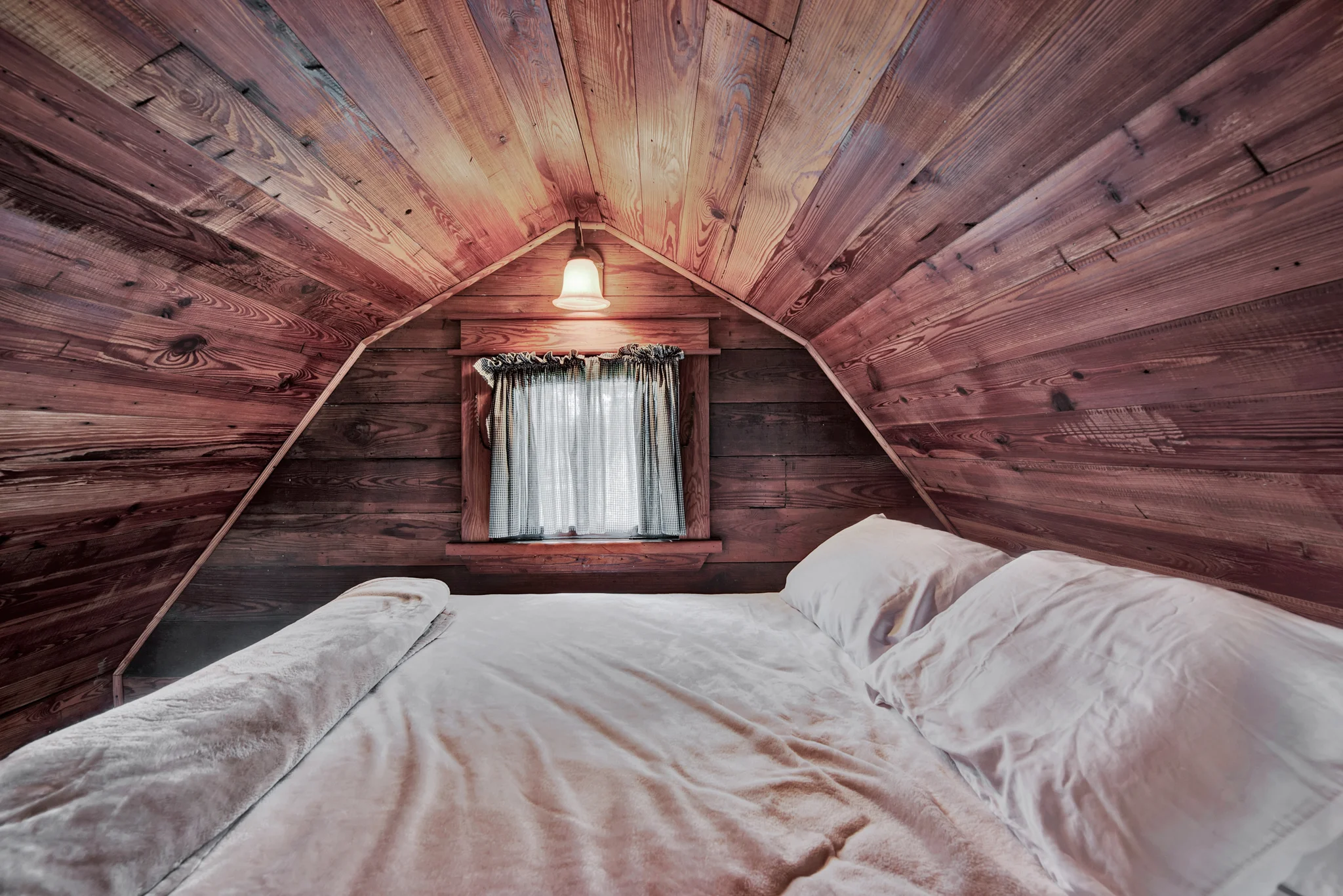 cozy bed in a loft